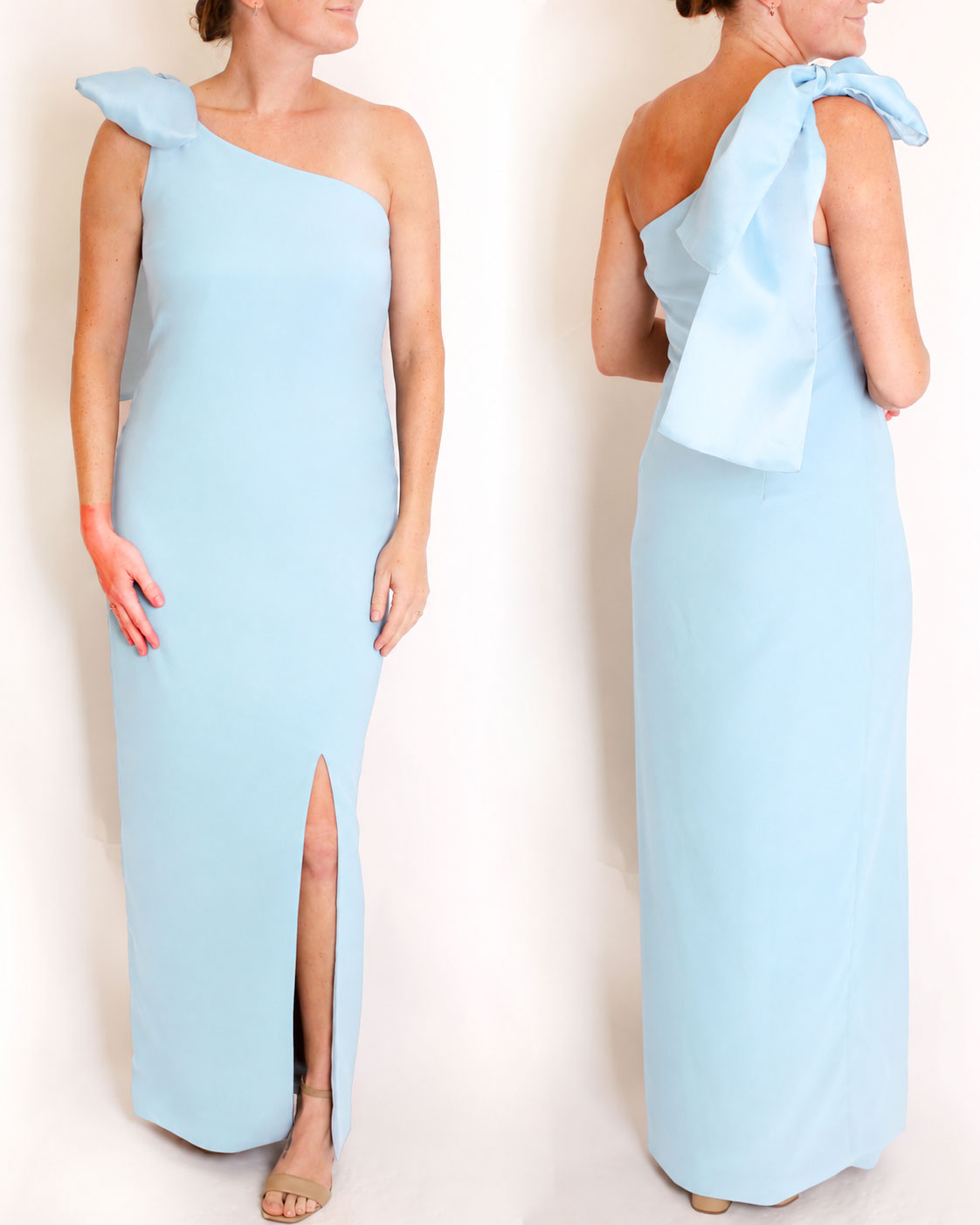 Light Blue one-shoulder gown with a large bow detail on a white background