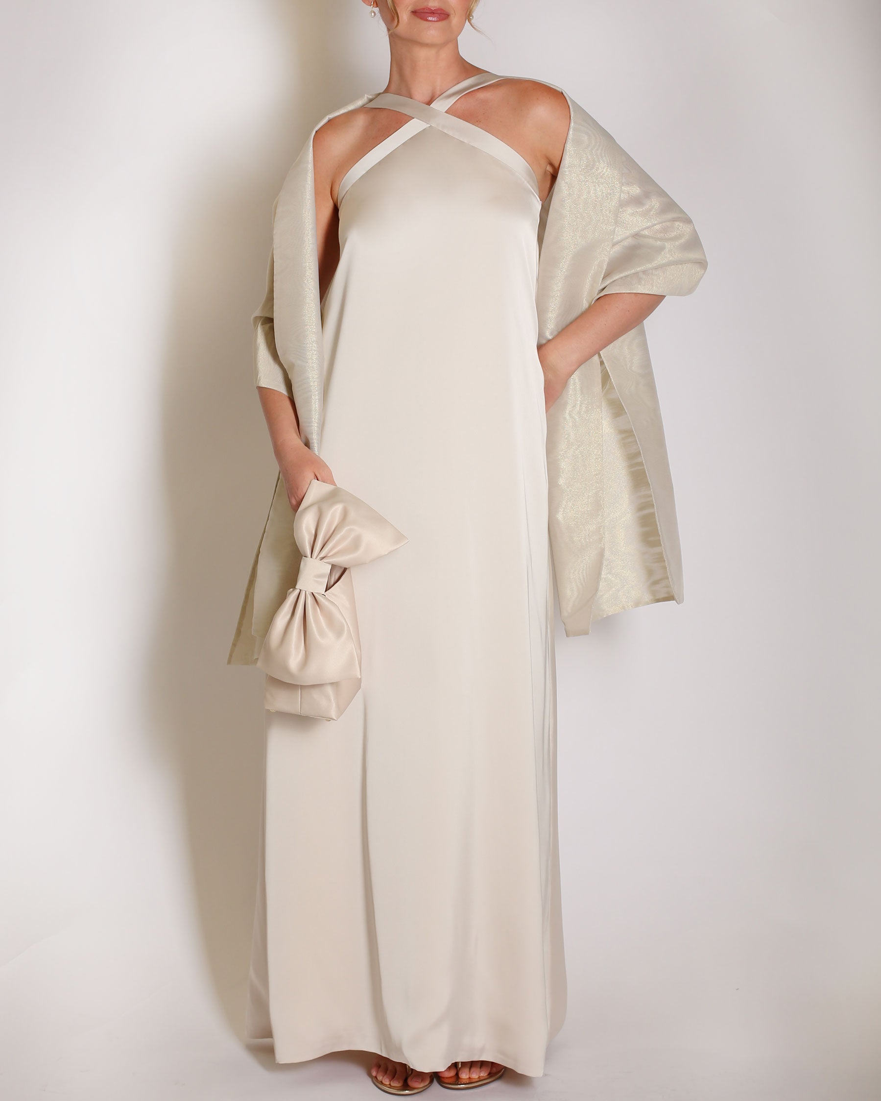 Champagne Charmeuse gown halter style with x on the neckline.