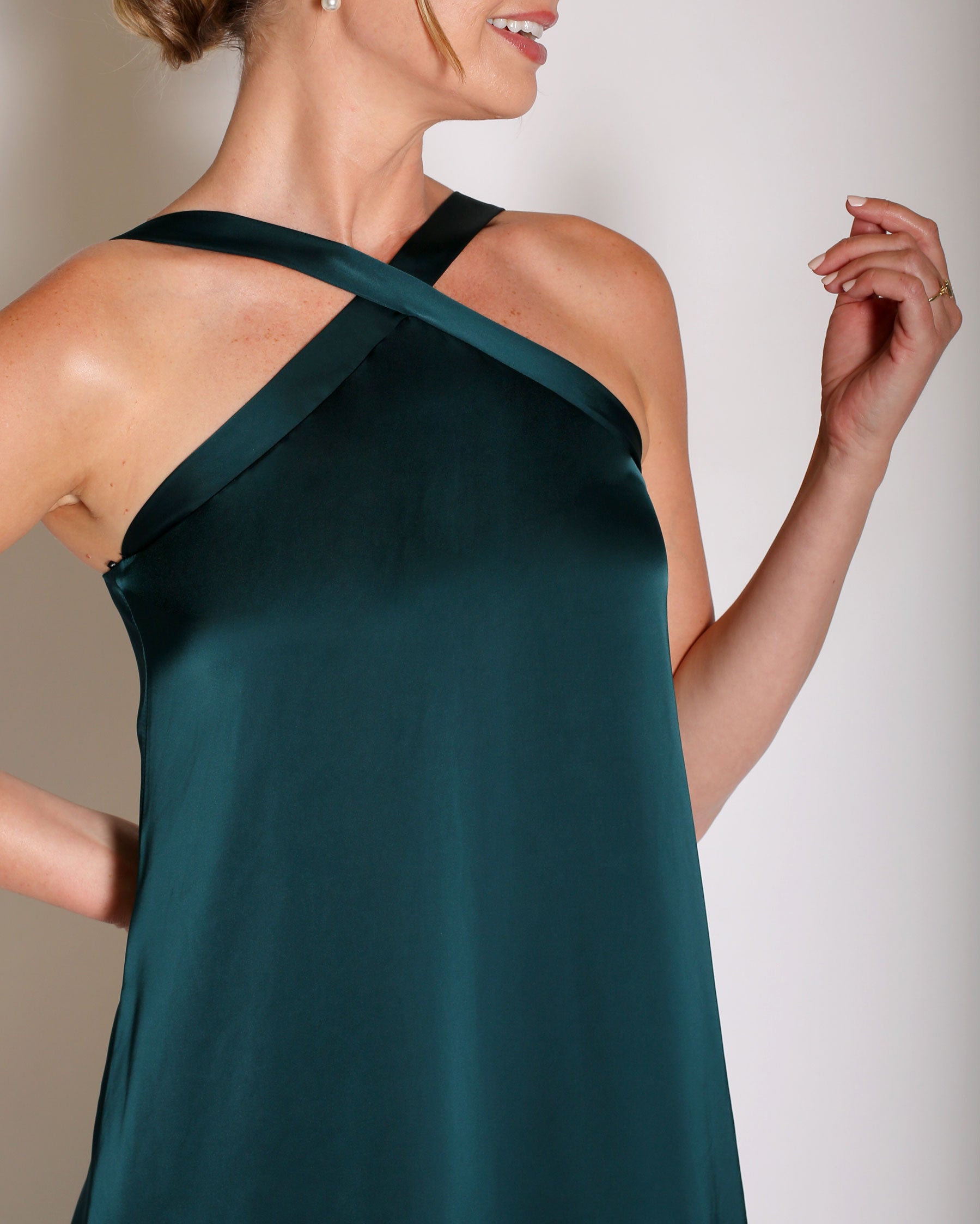 Evergreen Charmeuse gown halter style with x on the neckline.