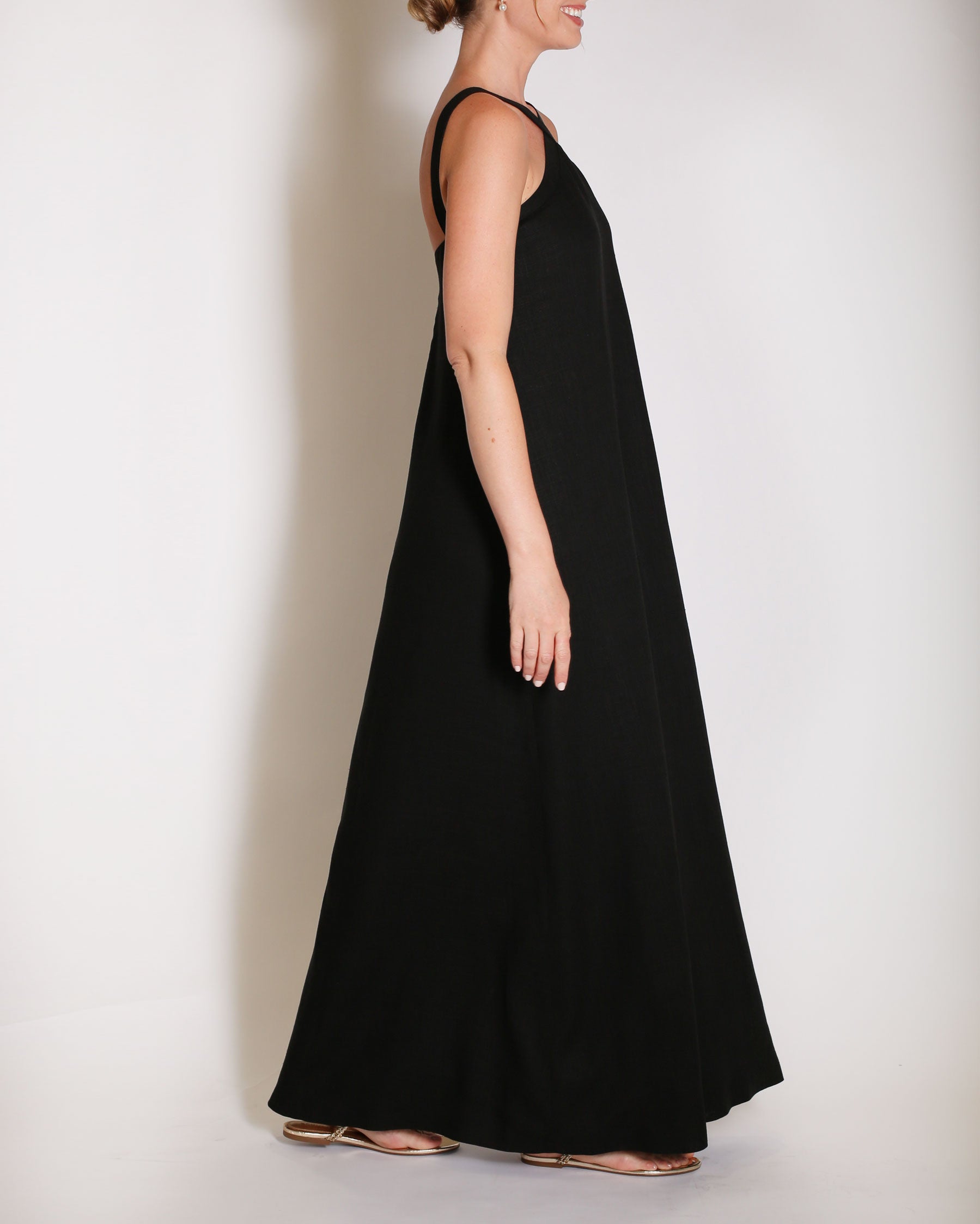 Black linen gown halter style with x on the neckline.