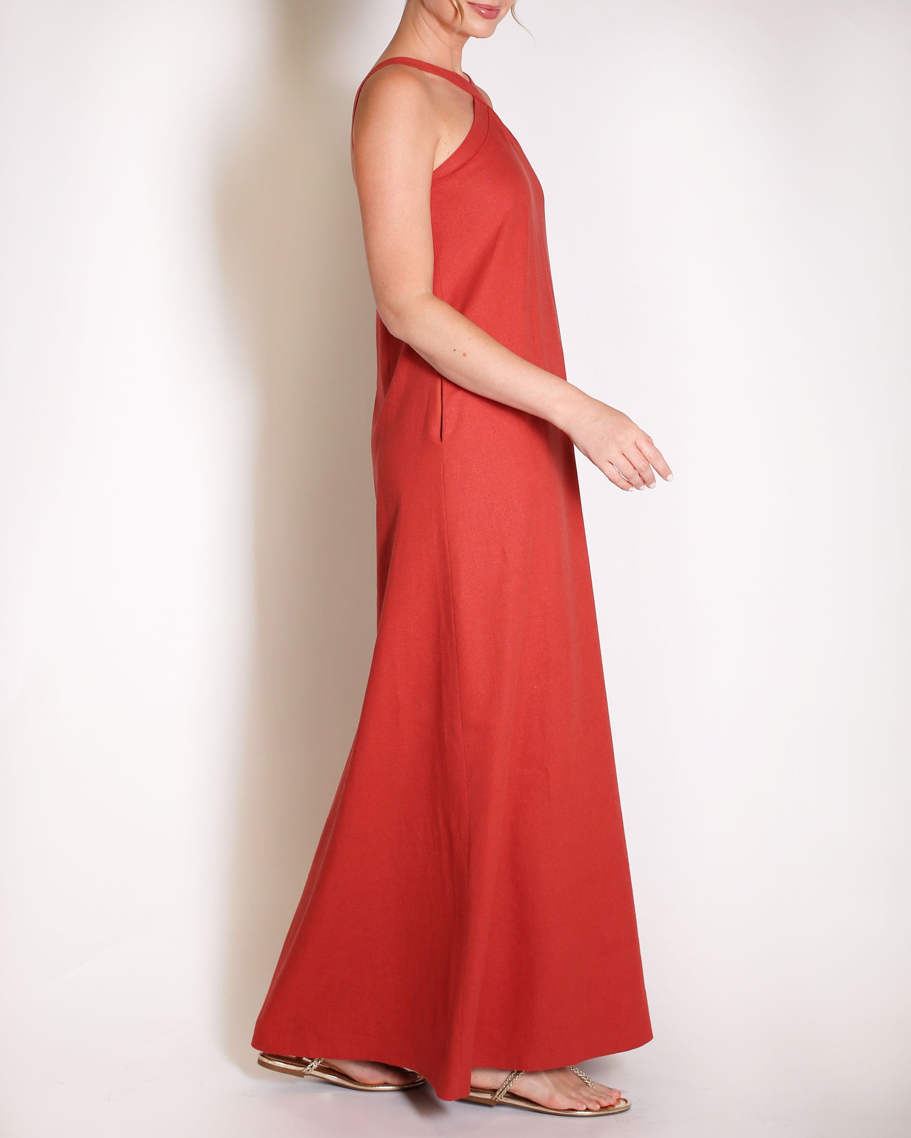 Terracotta linen gown halter style with x on the neckline.