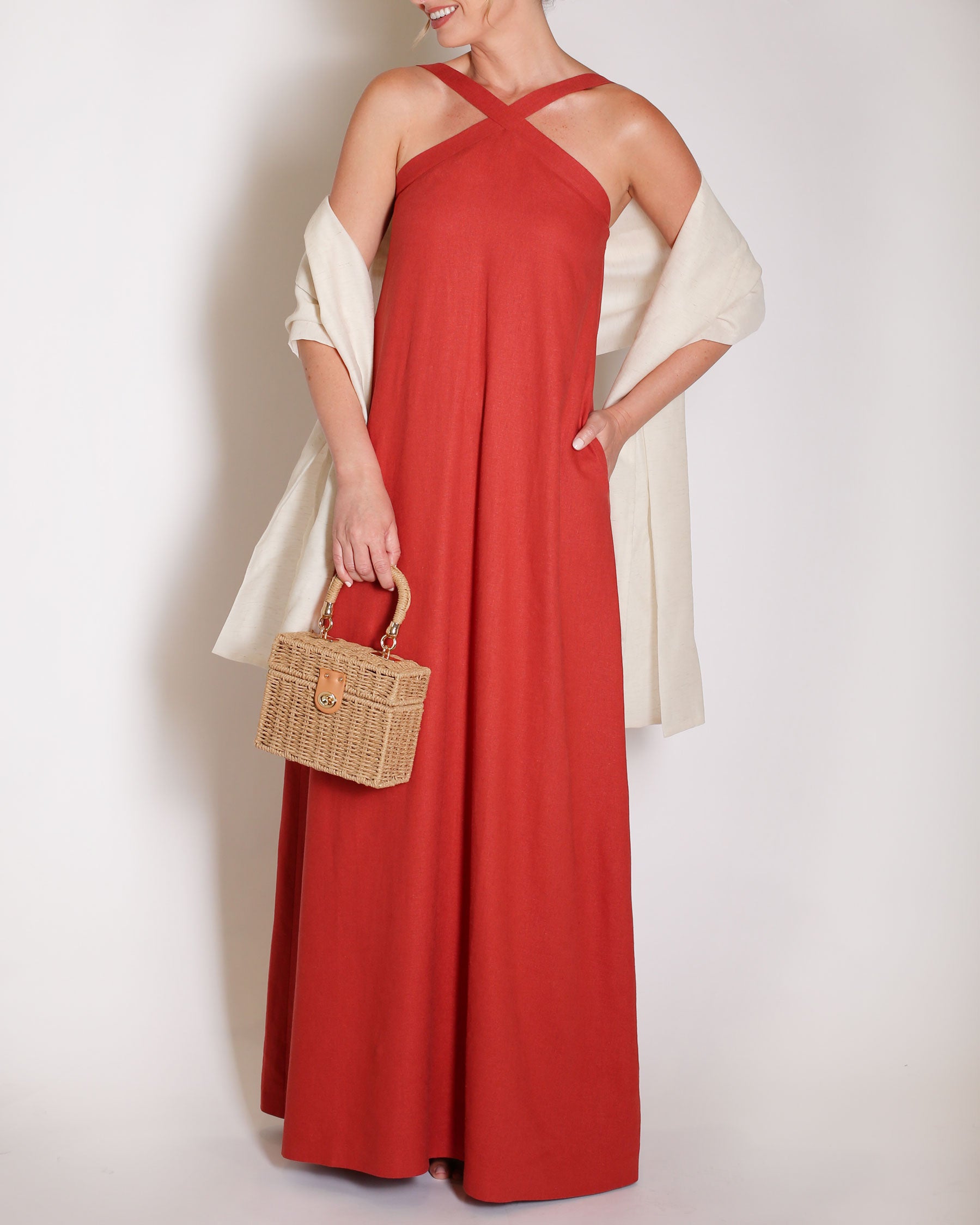 Terracotta linen gown halter style with x on the neckline.