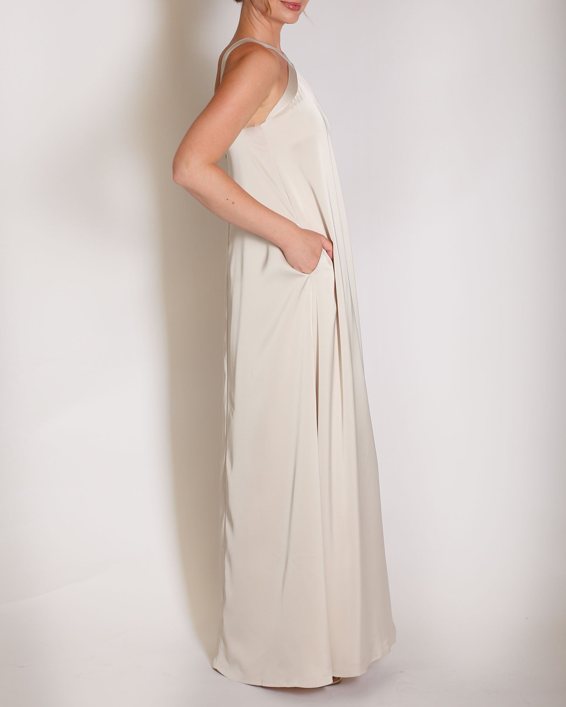 Champagne Charmeuse gown halter style with x on the neckline.