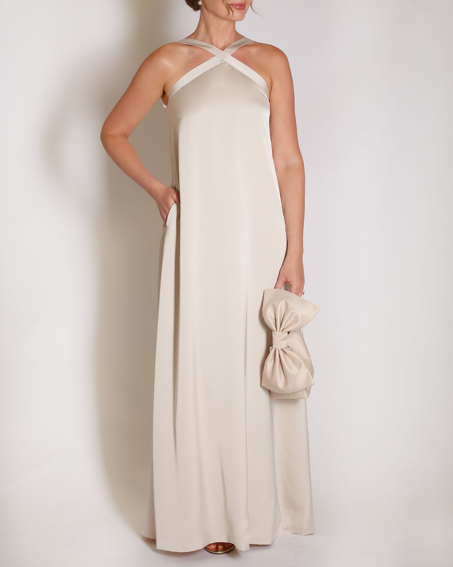 Champagne Charmeuse gown halter style with x on the neckline.