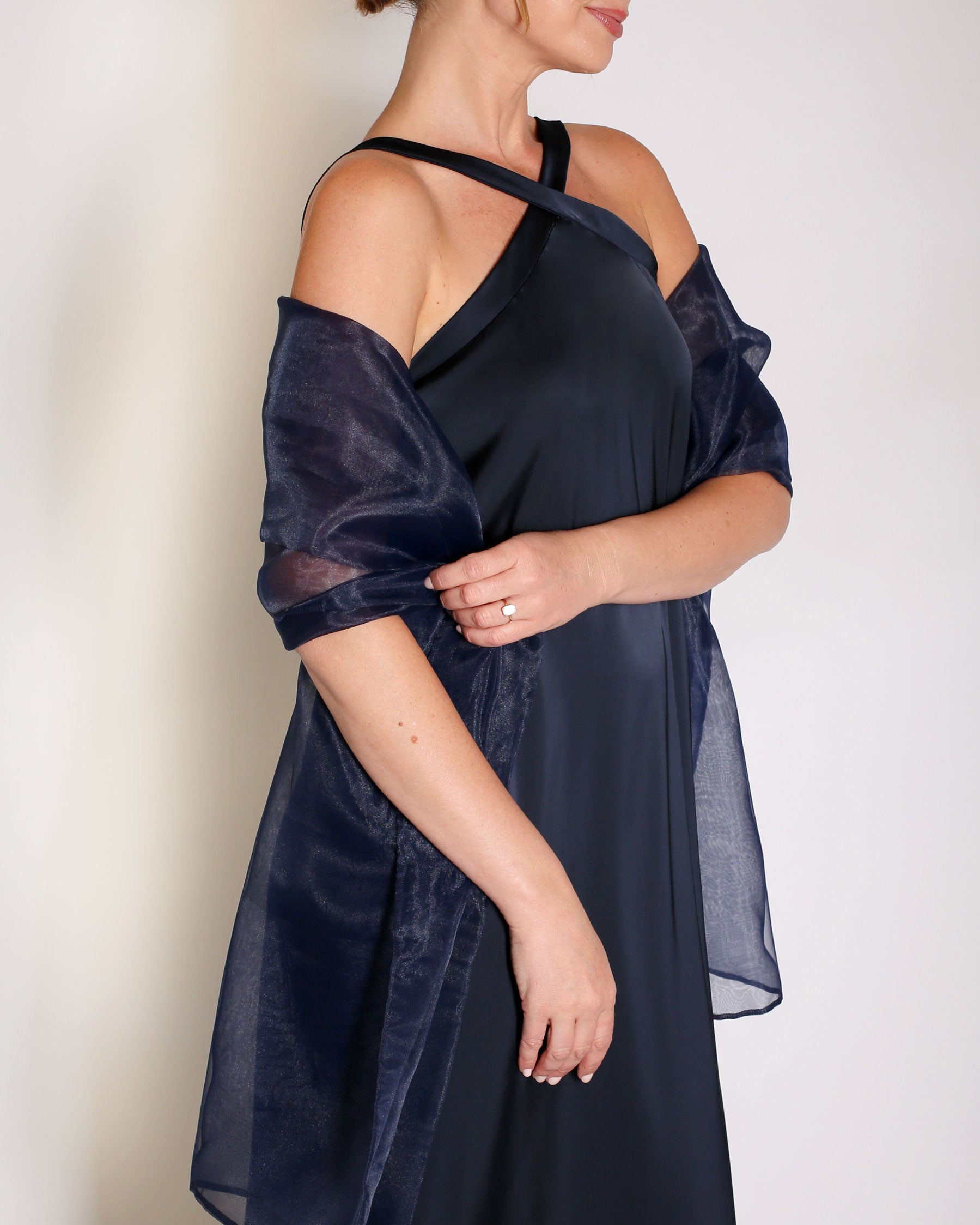 Navy Charmeuse gown halter style with x on the neckline.