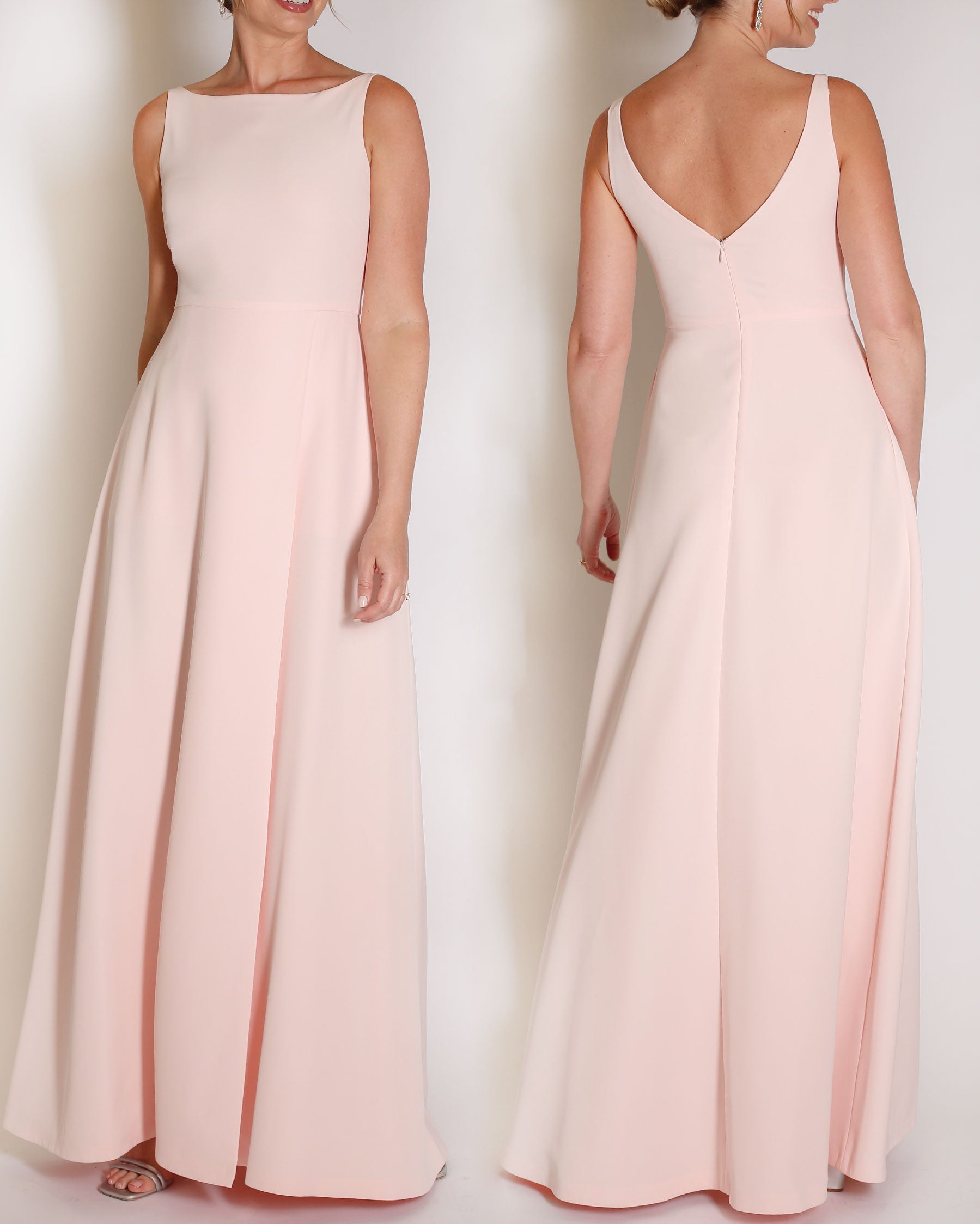Light Pink floor length evening gown with boat neck detail and v-back. A-line flared skirt with front side slit and pockets.