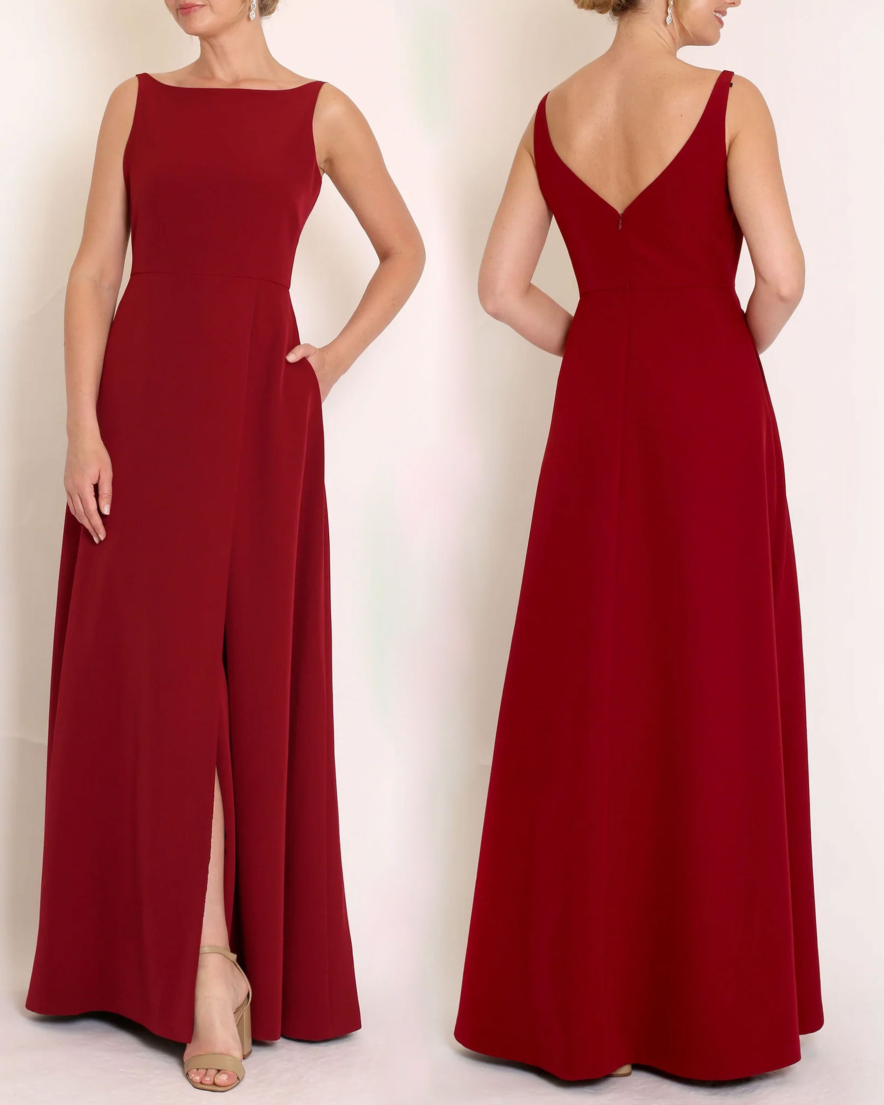 Burgundy floor length evening gown with boat neck detail and v-back. A-line flared skirt with front side slit and pockets.