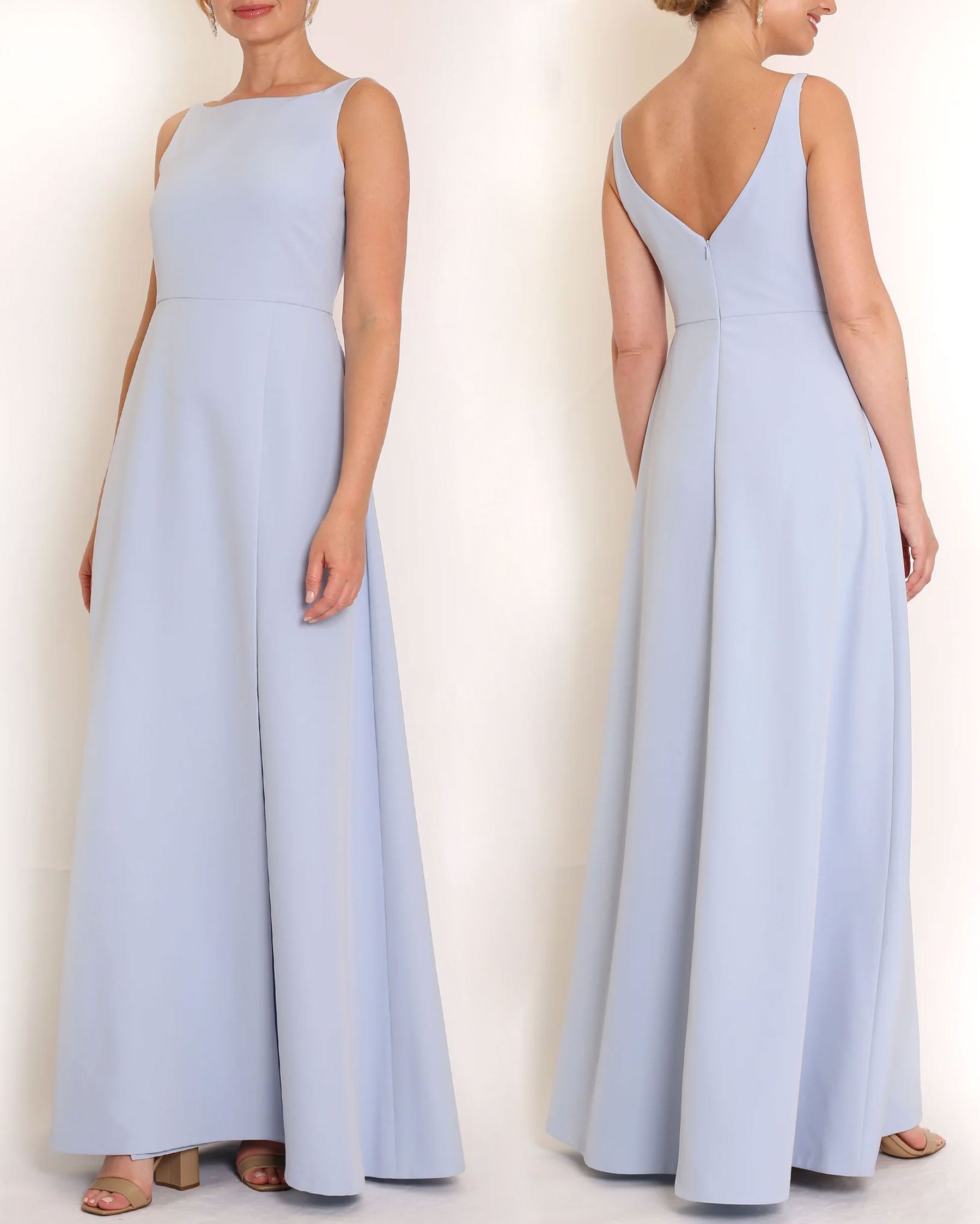 Light Blue floor length evening gown with boat neck detail and v-back. A-line flared skirt with front side slit and pockets.